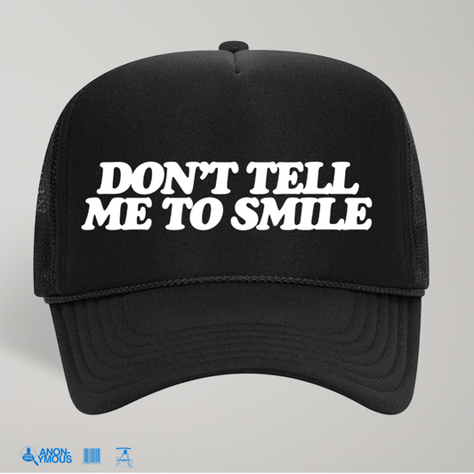 Don't tell me to smile Trucker Hat