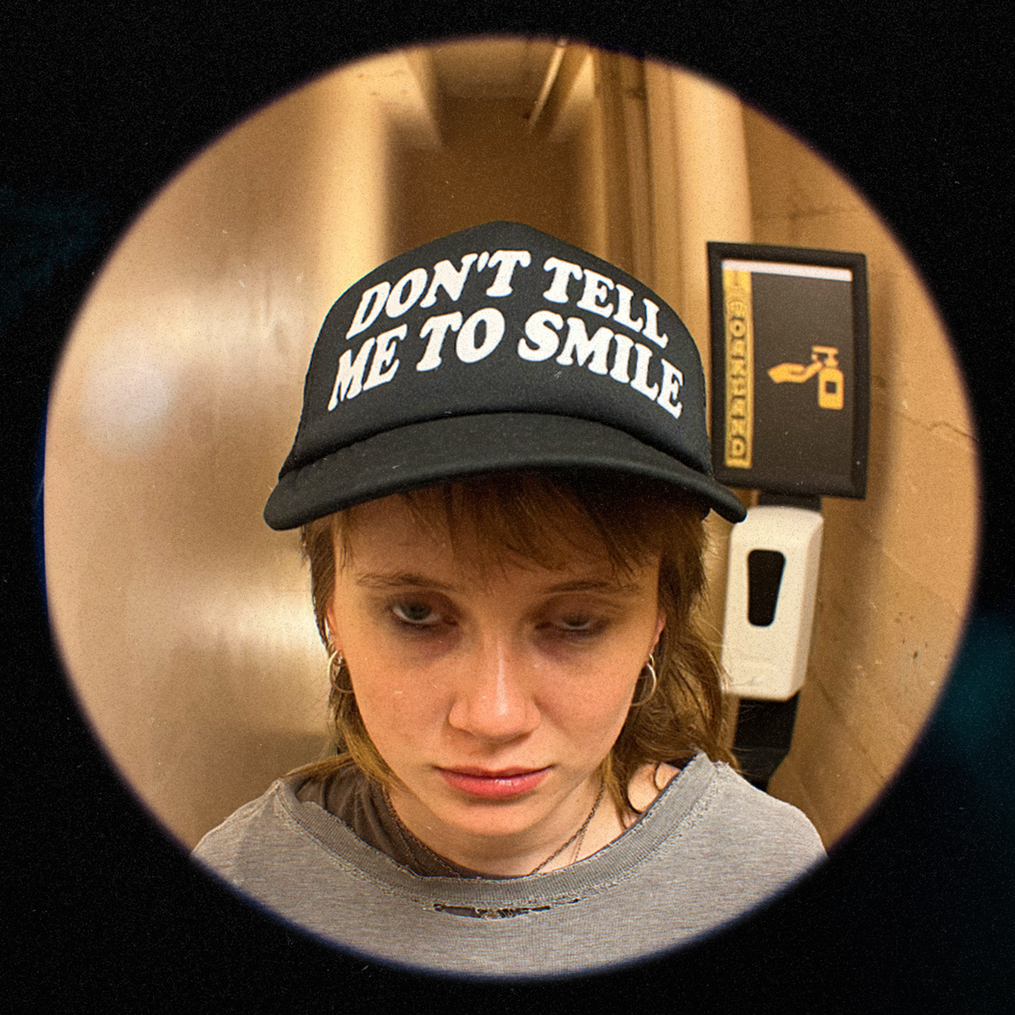 Don't tell me to smile Trucker Hat